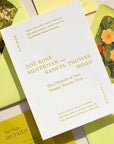 Wedding invitation card with floral designs on envelopes