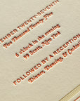 Invitation card with text details on beige background