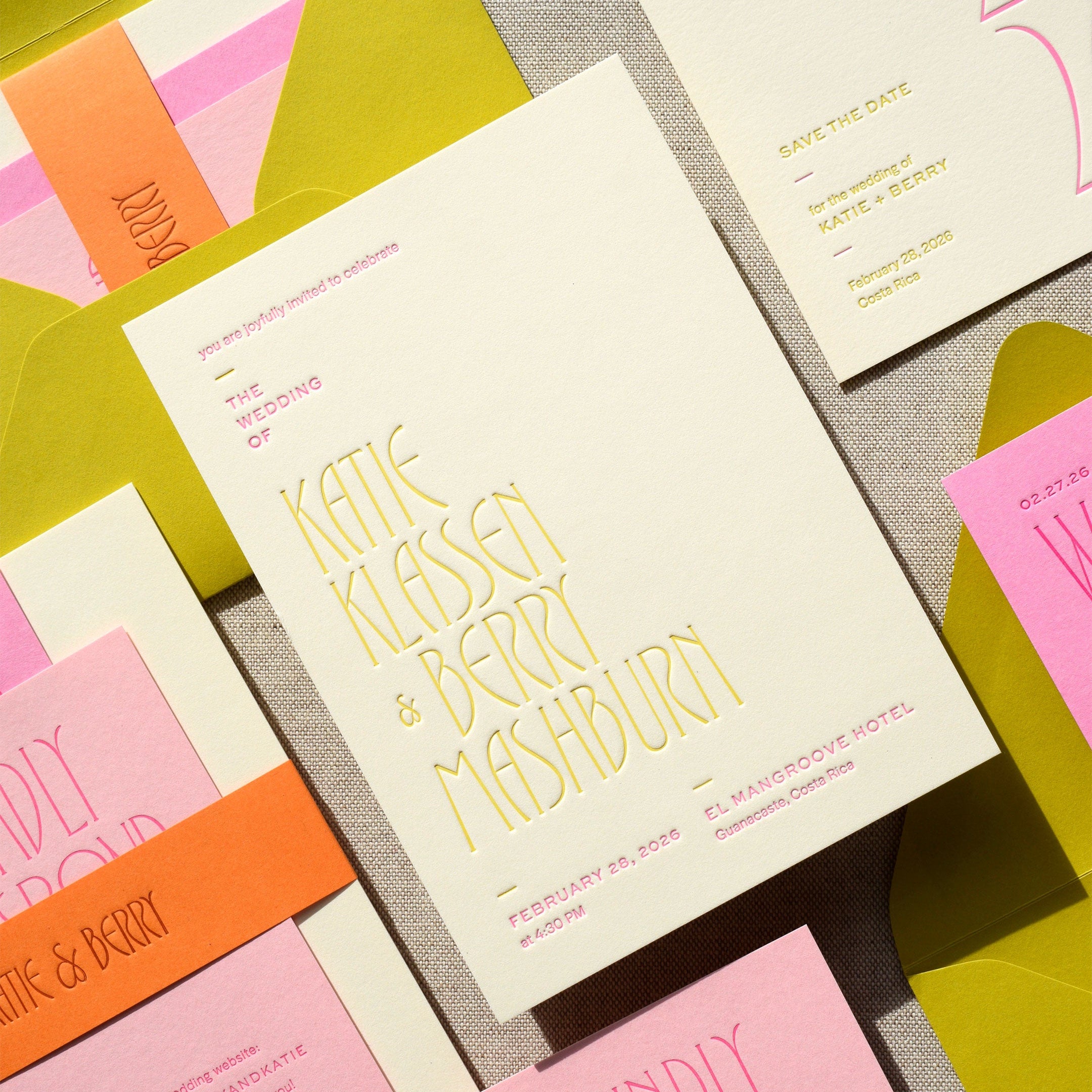 Collection of colorful stationery items with text on a patterned background