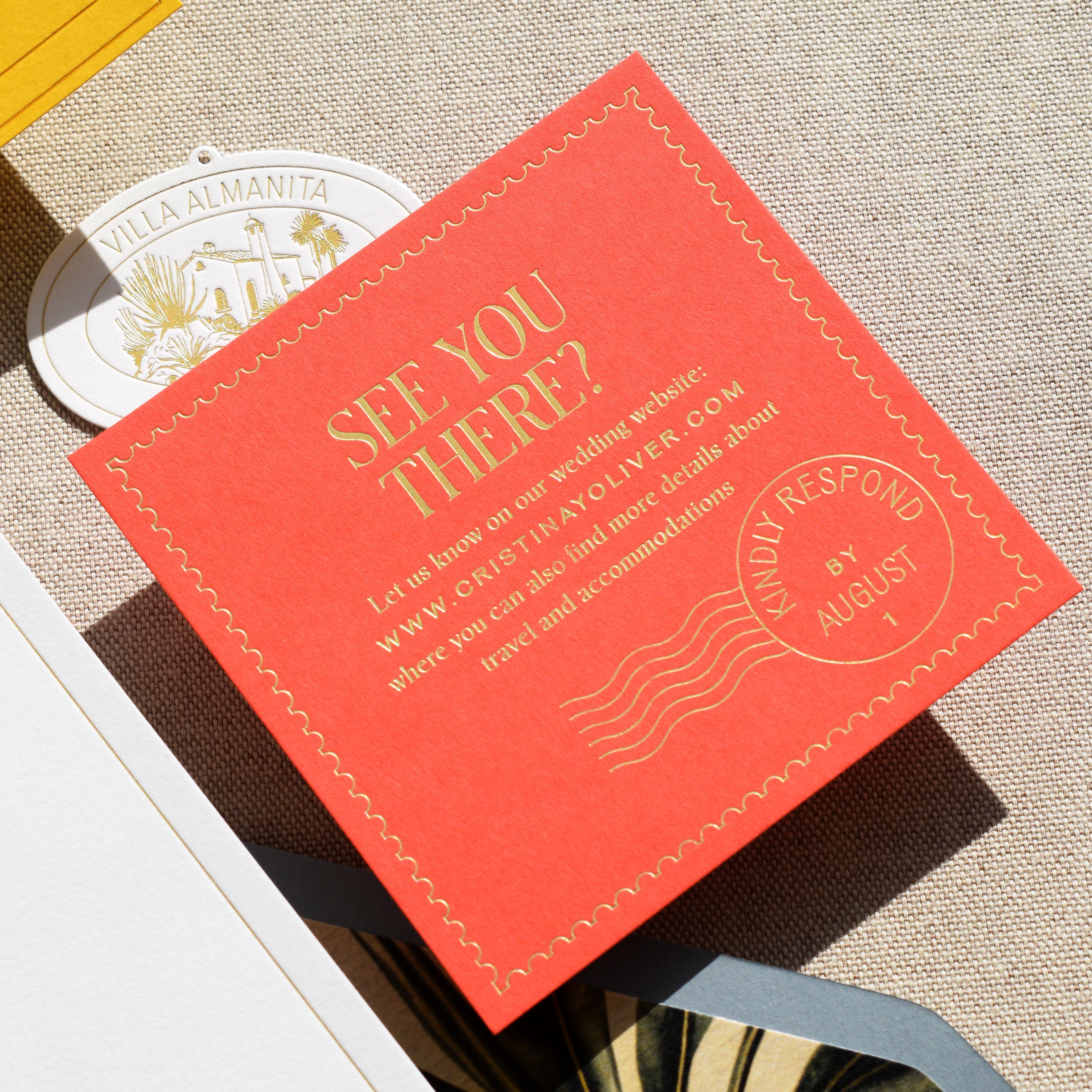 Red invitation card with 'See You There?' text on a textured surface