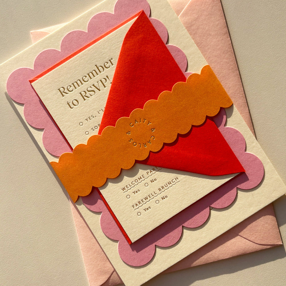 Invitation card with red envelope on a beige background